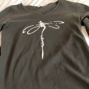 Long sleeve comfy top with dragon fly design. Size M